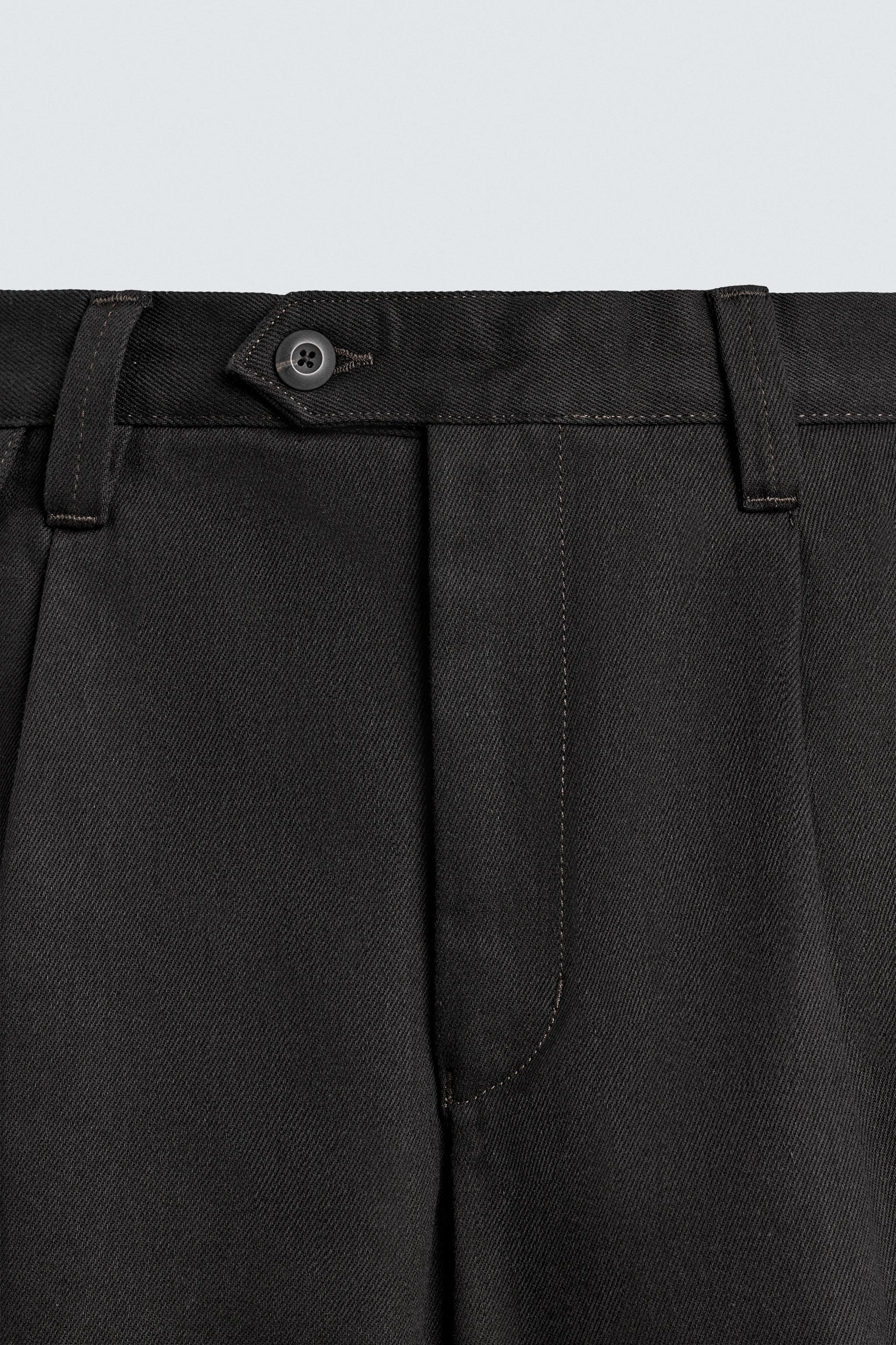 PLEATED BALLOON FIT JEANS